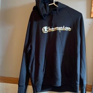 Black Champion Hooded Sweatshirt with Gold and White writing.